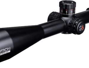 Black rifle scope with adjustable turrets and a magnification dial, shown in a tilted side view.