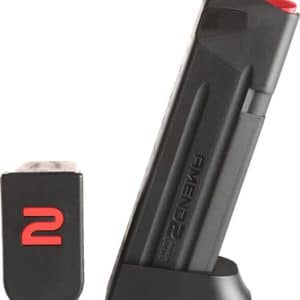 Black USB flash drive with a red-accent cap placed on a curved stand, logo visible on the cap side.