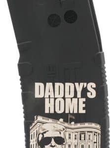 Black firearm magazine with 'DADDY'S HOME' graphic showing a man in sunglasses in front of the White House.