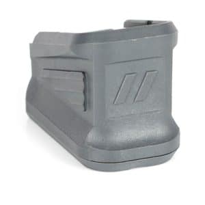 Rechargeable power tool battery pack in gray plastic, shown from the rear with a textured grip and angled grooves on the side.