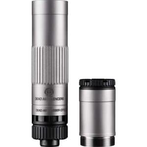 Two metallic firearm suppressor components laid side by side: a long knurled silencer and a shorter threaded adapter with a black base, both in silver/gray finishes.