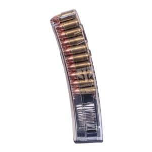 Curved transparent magazine loaded with copper-colored cartridges, angled to the right