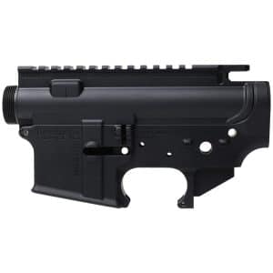 Black AR-style lower receiver with upper rail, shown in side profile view on a white background (informative image)./n