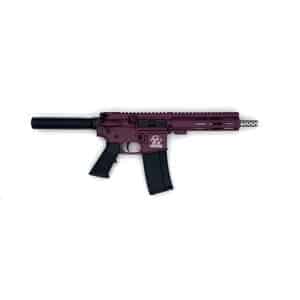 Purple AR-style rifle with a black suppressor and magazine on a white background.
