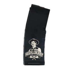 Black firearm magazine featuring a white cowboy illustration and the slogan "I'M YOUR HUCKLEBERRY" along the side.