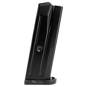 Black 9mm handgun magazine standing upright on its base plate.