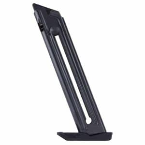 Diagonal black handgun magazine with baseplate resting on a surface.