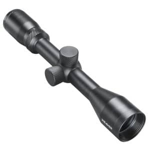 Black Weaver rifle scope with three knurled adjustment knobs and large objective lens, shown at an angle against a white background.