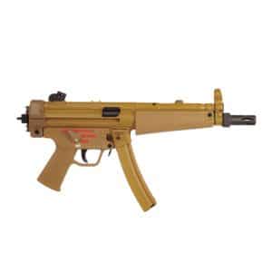 Tan plastic replica of a compact assault rifle with a curved magazine and side markings, likely a toy or airsoft gun
