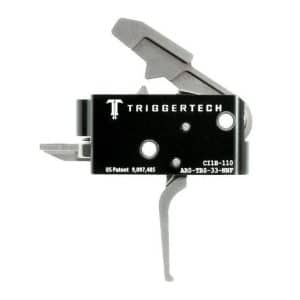 TriggerTech AR-15 drop-in trigger in black with silver levers and logo, shown from a side angle