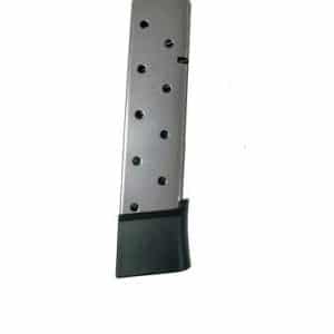 Detachable metal handgun magazine with a black base plate and circular witness holes along its side.