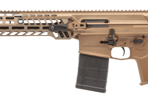 Tan tactical semi-automatic rifle with a long rail system, attached magazine, and adjustable stock shown in profile