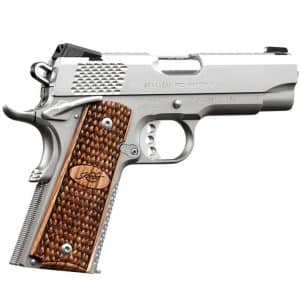 Silver semi-automatic pistol with brown checkered wooden grip, shown in side profile.