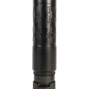 Black tactical flashlight with textured grip and tail-cap switch, standing upright.