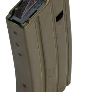 Beige curved firearm magazine with metal feed lips on a white background, viewed from an angled side.