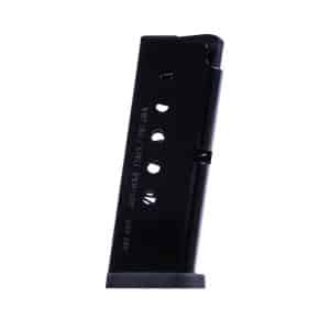 Black handgun magazine standing upright on a small gray platform/footing, shown with round-count holes along its side.