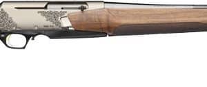 Side view of a double-barrel shotgun with a wooden stock and engraved receiver.