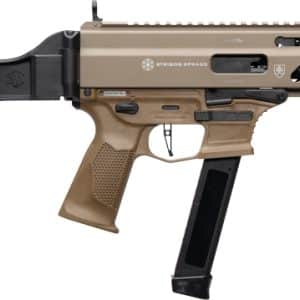 Side view of a tan and black semi-automatic rifle with a foldable stock and a curved magazine.