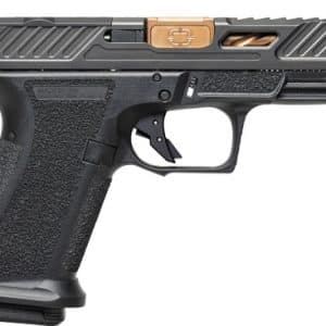 Side view of a modern semi-automatic pistol with a black textured grip and dark metallic slide with copper accents