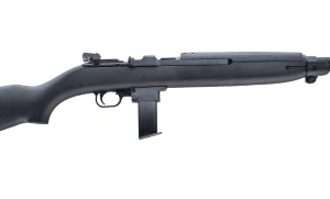 Side view of a black semi-automatic rifle with a detachable magazine in profile.