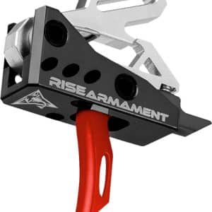 Close-up of a Rise Armament AR-15 trigger assembly with a red curved trigger and metal housing, shown at an angle.