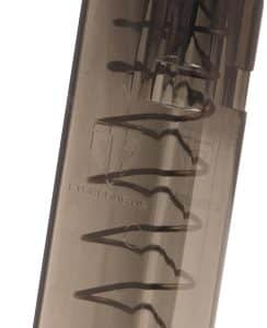 Translucent pistol magazine with a visible coil spring and a red follower.