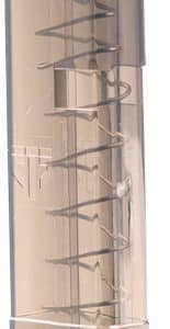 Transparent brown firearm magazine showing the red follower at the top and the visible coiled spring inside.