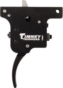 Timney Triggers rifle trigger assembly in black metal housing with a curved trigger.
