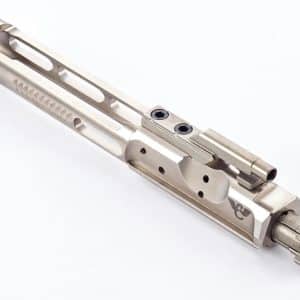 Machined stainless gun part with rail-like openings and a muzzle extension on white background
