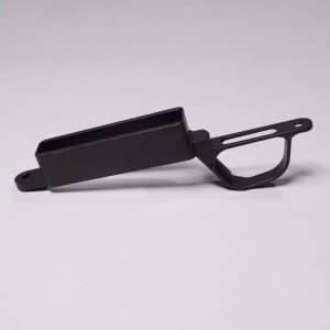 Black handheld tool with a rectangular hollow tray and a curved, slotted grip at the end.
