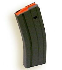 Detachable pistol magazine with an orange follower at the top, curved black body.