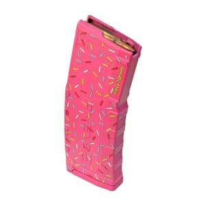 Pink toy gun magazine decorated with multicolored sprinkles.