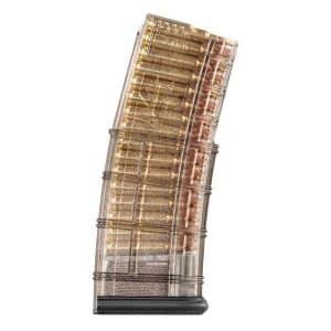 Transparent rifle magazine loaded with copper-colored bullets viewed at an angle.