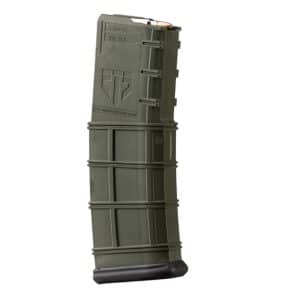 Olive-green 5.56x45mm rifle magazine standing upright with a ribbed body and black base plate.