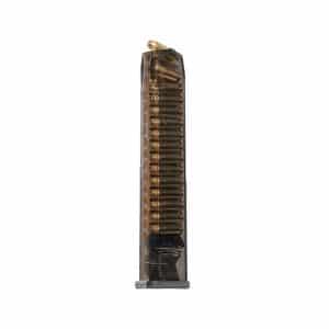 Loaded handgun magazine with copper-colored rounds visible inside and a spring at the bottom