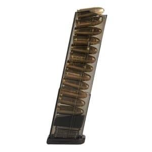 Transparent ammunition magazine filled with brass cartridges, standing upright on its base.