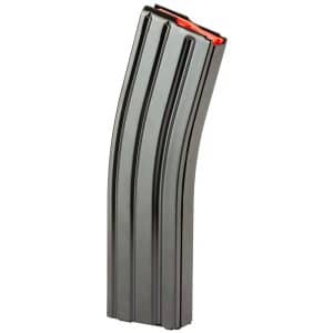 Curved metal rifle magazine with an orange follower at the top, standing upright.