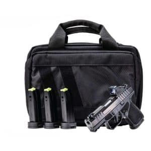 Semi-automatic pistol with three magazines and a black carry bag