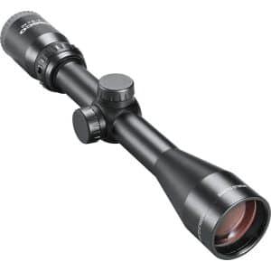Black riflescope with two adjustment knobs and a large front lens, viewed at an angle for product detail