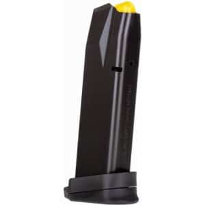 Black handgun magazine with a yellow follower, standing upright on a base plate at the bottom edge of the image.
