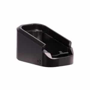 Black plastic camera accessory with a slot, likely a hot‑shoe mount cover or adapter