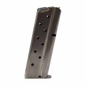 Metal handgun magazine angled upright, showing cartridge ejection holes along the side.