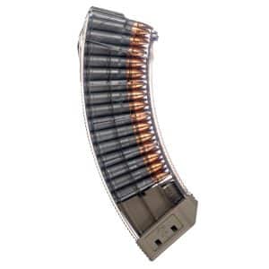 Partially loaded curved rifle magazine with copper-jacketed bullets visible at the top side.