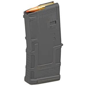 Dark gray rifle magazine loaded with a copper cartridge visible at the top, stamped '7.62 x 39' on the side.