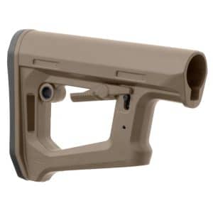Close-up of a tan adjustable rifle stock butt with a textured surface and hinge mechanism visible on the side