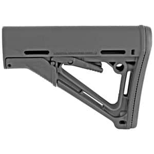 Close-up of a black Magpul rifle stock with adjustment lever and sling mount against a white background.