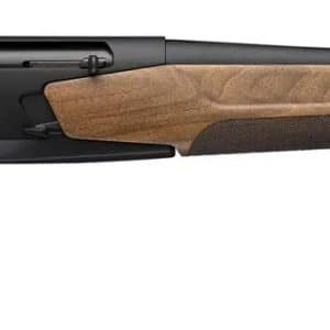 Long-barreled shotgun with a wooden stock photographed in profile, showing a classic hunting rifle design