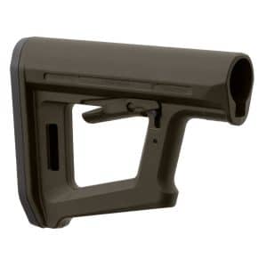 Tan rifle buttstock viewed from the side, showing a textured polymer surface and hollow channel