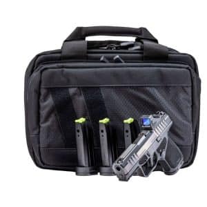 Black tactical bag with a pistol and four magazines arranged in front of it on a white background.