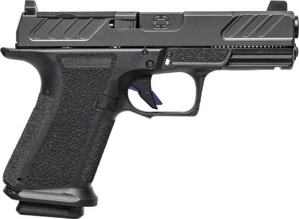Side view of a black semi-automatic pistol with a textured grip and ergonomic trigger guard.
